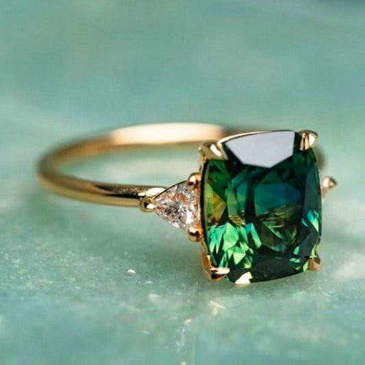 LUCK | Anillo dorado con circonita verde